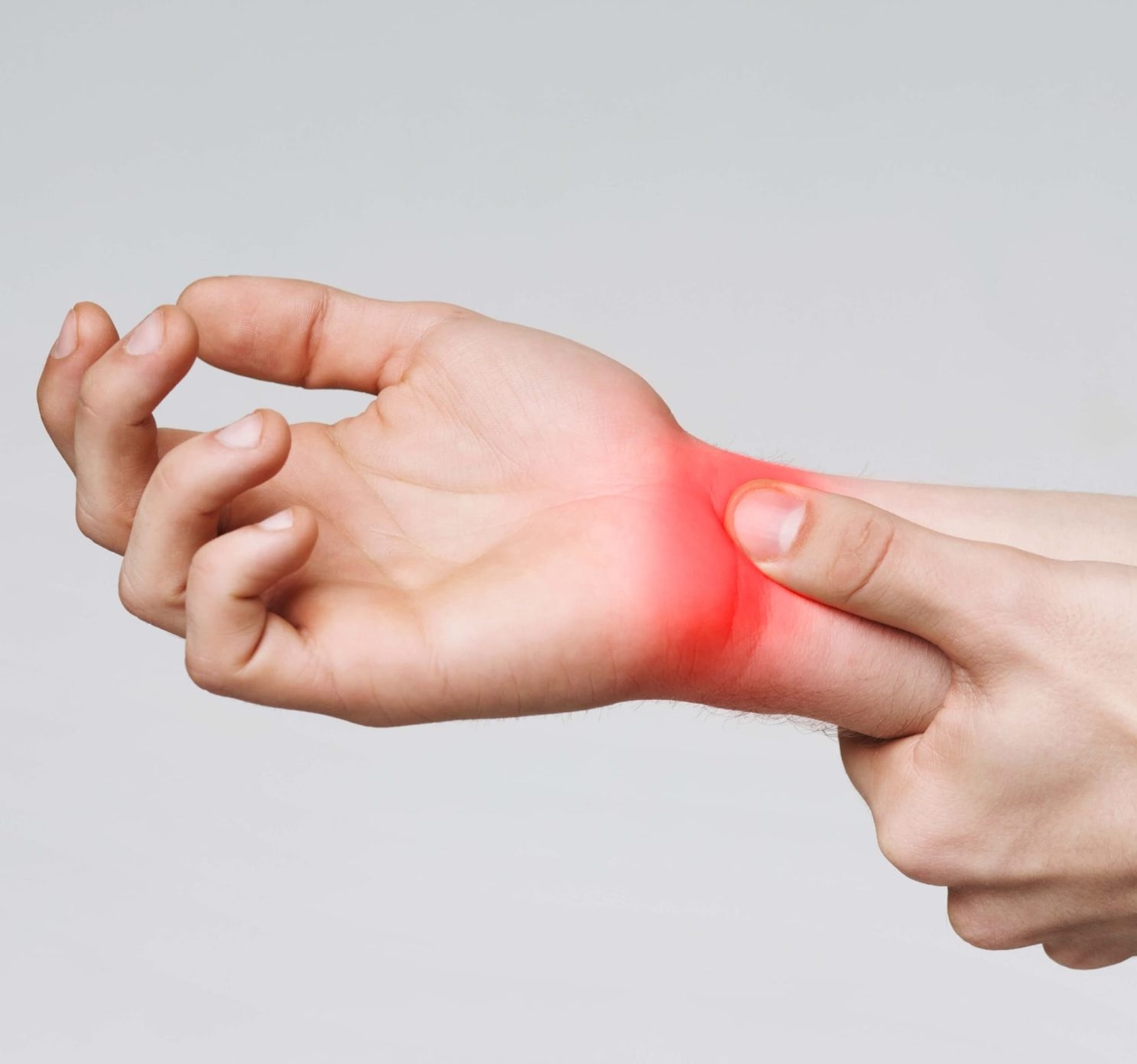 hand with wrist pain highlighted in red