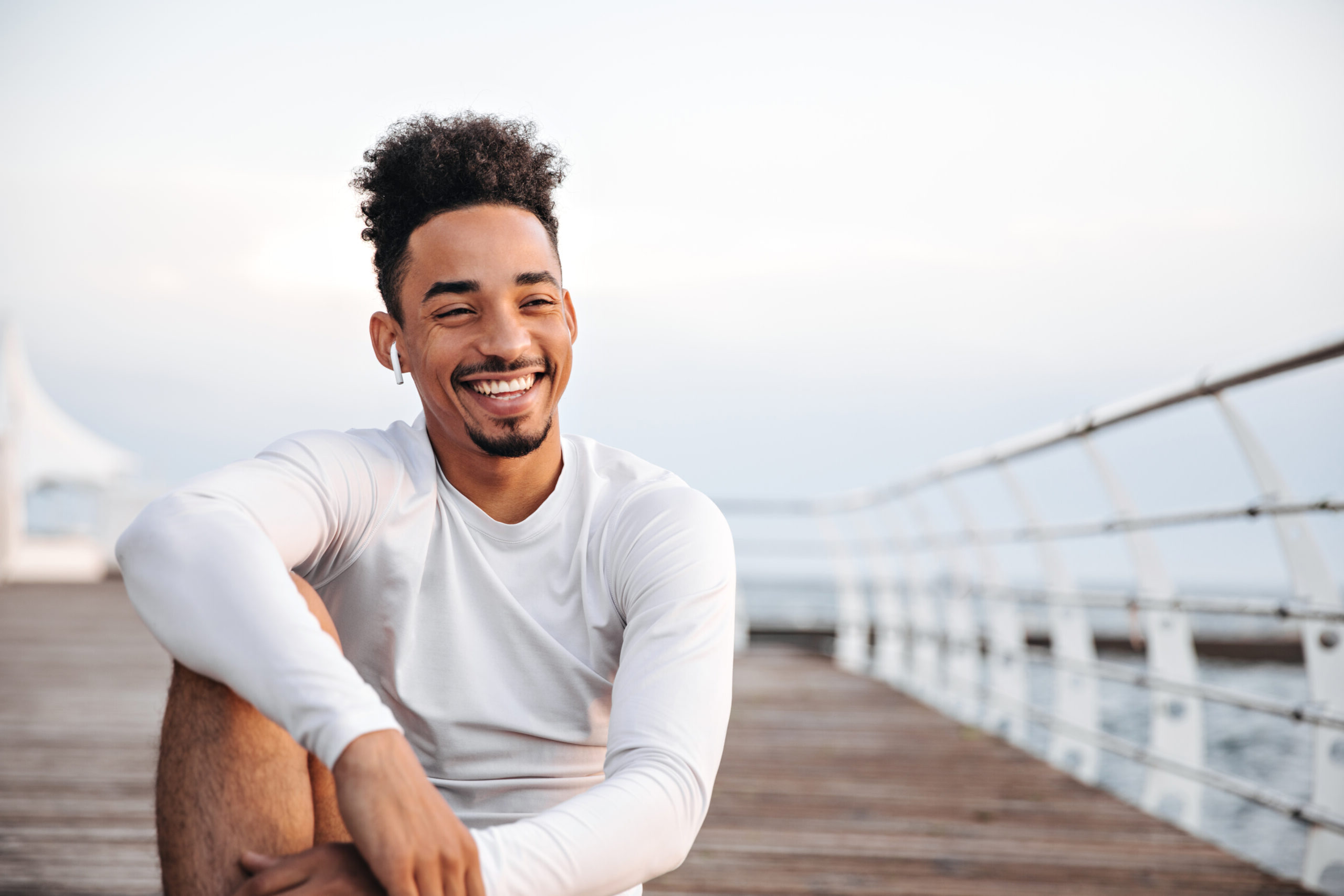 Happy man on pier